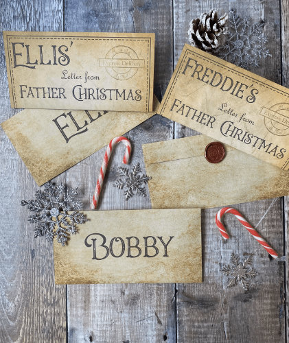 Personalised Letter from Santa Flatlay Photo of Personalised Letters from Father Christmas with Matching Envelopes